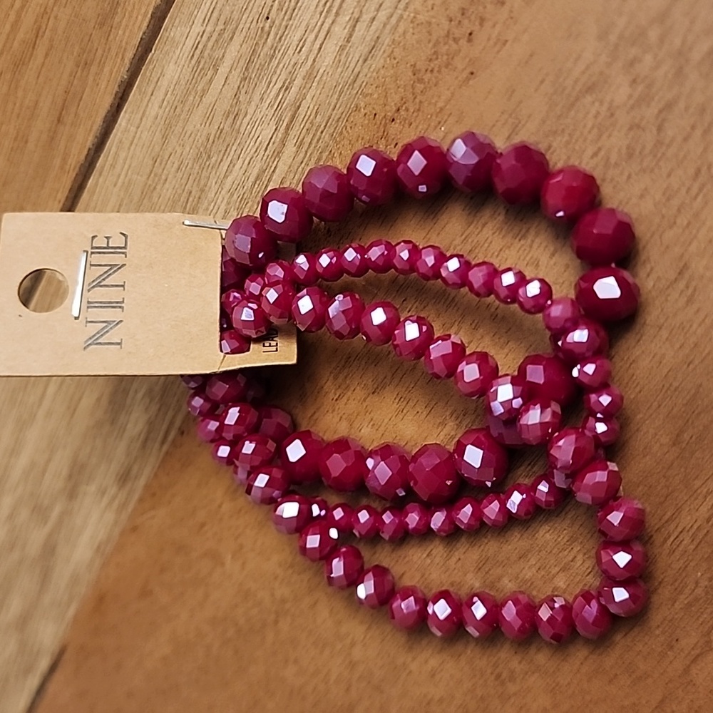 Nine merlot bracelets (3 of them)